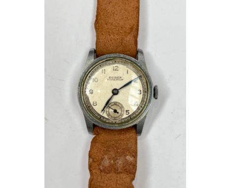 A WWII wristwatch by Buren, back stamped A.T.P., with broad arrow