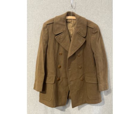A WWII US Army officer’s overcoat, doeskin wool, short style, dated 1945, size 38R