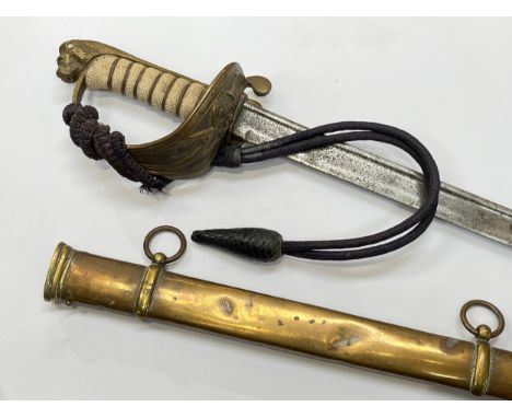 A Royal Naval Officer's sword, the brass hilt with King's crown naval cypher and ray skin grip, joining a pipe-back blade, ho