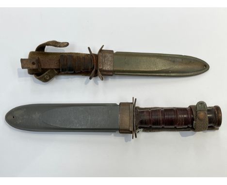 Two US fighting knives, one a/f, the other with USN Mk. 2 to scabbard