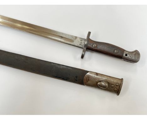 A British 1907 pattern bayonet by Wilkinson, with steel mounted leather scabbard