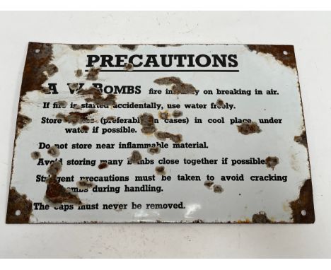An A.W Bombs (incendiary Bombs) enamel sign, worn