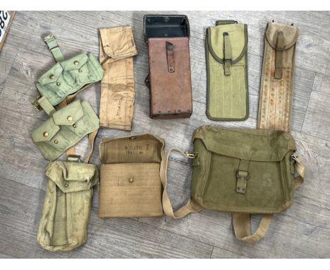 A box of mixed webbing including 1941 dated webbing binocular case, wartime ammo pouch etc