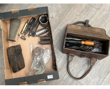 A box of tools including WD leather tool box with various contents
