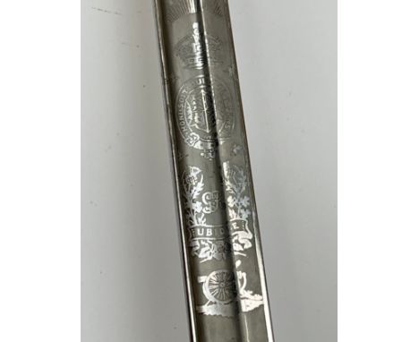 An early 20th Century Royal Artillery officer's sword, the three bar hilt with shagreen grip joining an engraved blade by R. 