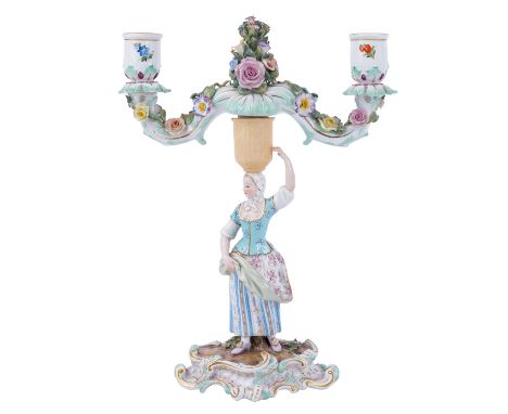 MEISSEN “Leuchter mit Gärtnerfigur”, 1814-1860, Figürlicher Leuchter mit Gärtnerin, reich staffiert und part. goldgehöht, obe