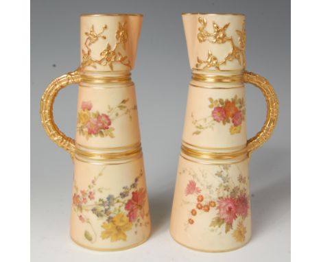 A pair of circa 1900 Royal Worcester blush ivory vases, of tapered cylindrical form, each with painted floral decoration with