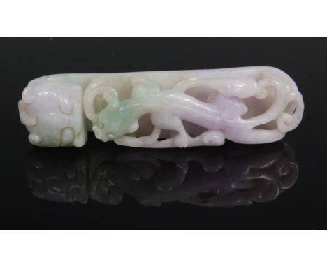 A Chinese carved celadon and amethyst jade belt buckle, of dragon mask and lizard type creature, 8.2cm Condition Report / Ext