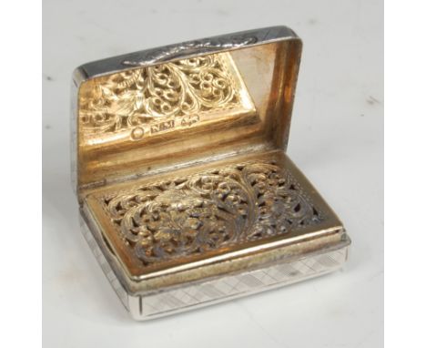 A George IV silver vinaigrette, of rectangular form, having monogrammed cartouche, engine turned all-over decoration, the rai