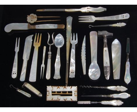 A large collection of 19th century and later mother of pearl instruments and implements, to include; folding pocket knives, b