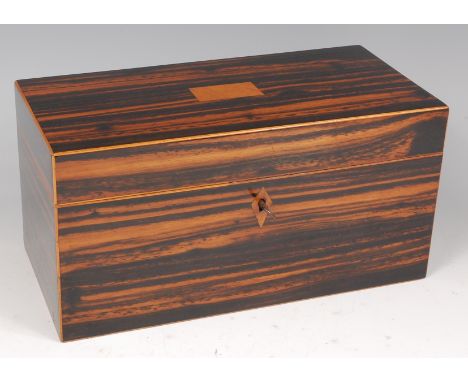 A Victorian coromandel fitted tea caddy, of rectangular form, having satinwood inset hinged cover opening to reveal fitted in