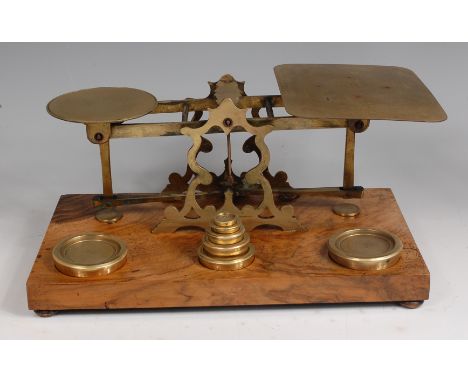 A Sampson Mordan & Co late Victorian figured walnut and brass postal scale, with graduated weights, w.33.5cm