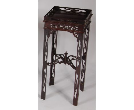 A late 19th century mahogany fret carved lamp table, having a full gallery, united by X-stretcher, w.32cm, h.72cm
Provenance: