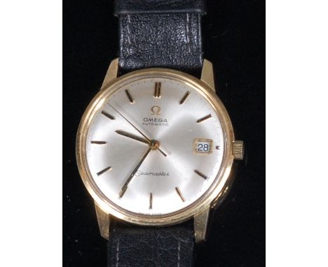 A gents Omega Seamaster 14ct gold cased wristwatch, having signed silvered dial, date aperture, automatic movement, and on re