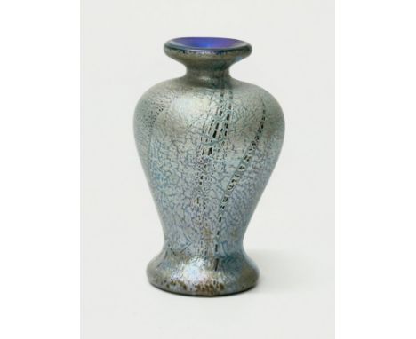 A small Art Nouveau iridescent glass vase. Possibly Loetz. 10cm