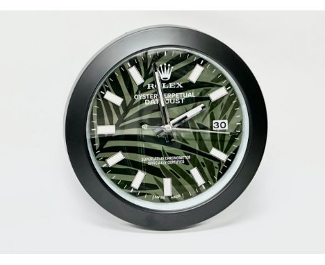 A Rolex Oyster Perpetual Datejust wall clock. 34cm