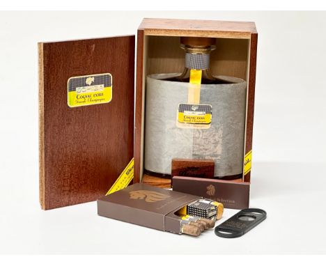 A Cohiba Cognac Extra Grande Champagne in wooden case.