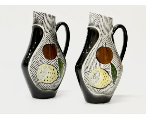 A pair of 1970’s Mid Century pitcher vases. 23cm