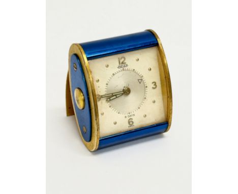 Jaeger-LeCoultre. A Mid 20th Century gilt brass travel alarm clock.
