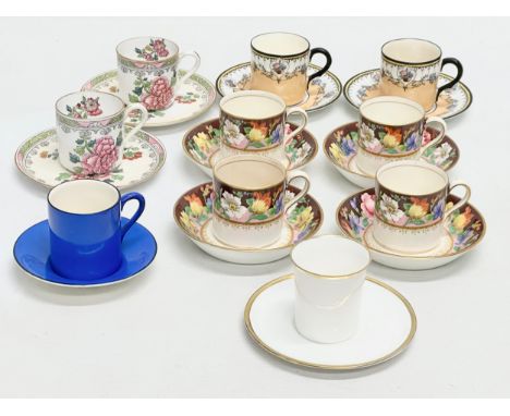 A good collection of Early 20th Century English porcelain coffee cans and saucers. A set of 8 Cauldon China coffee cans and s