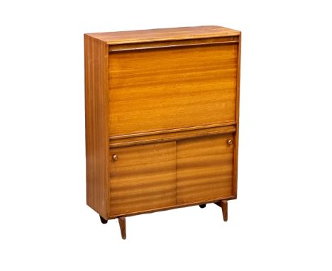 Archie Shine for Beaver &amp; Tapley. A Mid Century teak Multi Width bureau cocktail cabinet. Designed by Archie Shine for Be
