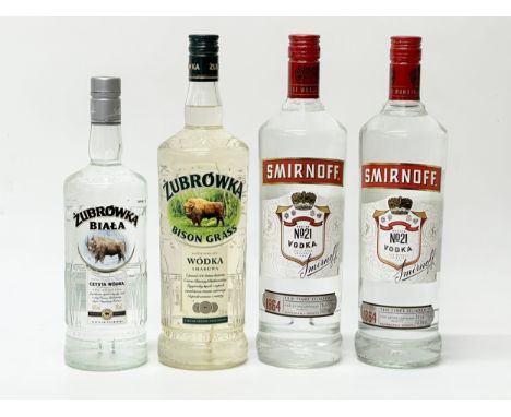 Four bottles of vodka. Zubrowka Bison Grass 1L. Zubrowka Biala 70cl. Two Smirnoff 1L.
