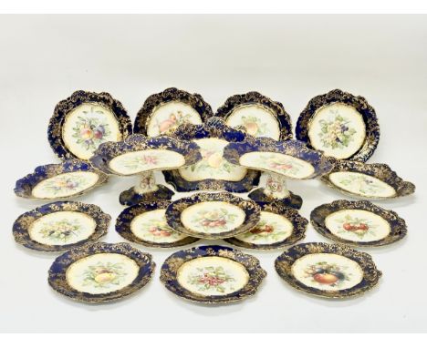 An Early 20th Century Hammersley &amp; Co dessert set. With hand pained gilding on a cobalt blue ground and various fruits. C