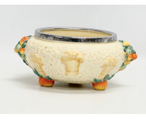 Clarice Cliff. A Celtic Harvest 3 footed bowl with plated rim. Designed by Clarice Cliff for Newport Pottery. 26x22x12cm