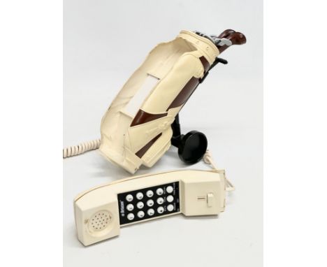 A Betacom novelty “Golf Bag” telephone.