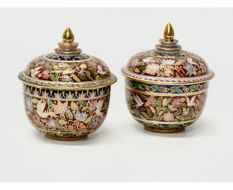 A pair of Thai Benjarong hand painted porcelain jars with covers. 8.5x11cm