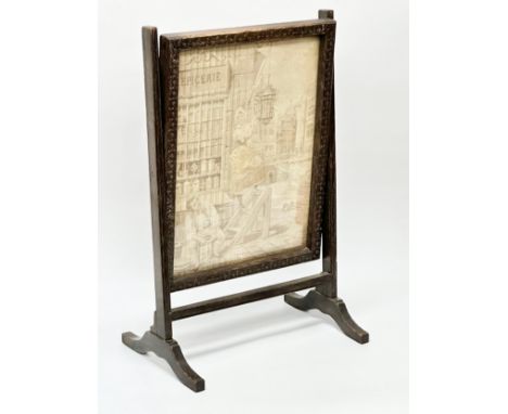 A 19th Century oak framed tabletop screen with tapestry panel. 38.5x25x61cm