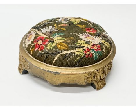 A 19th Century Victorian gilt footstool with tapestry top. 28x13cm