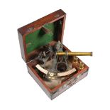 A PORTUGESE OXIDISED BRASS SEXTANT