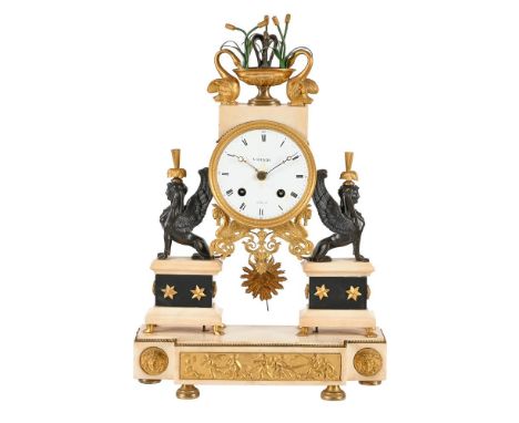 A LOUIS XVI NEOCLASSICAL ORMOLU, WHITE MARBLE AND BRONZE QUARTER-STRIKING MANTEL CLOCK  VOISIN, PARIS, CIRCA 1790    The circ