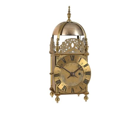 A WILLIAM AND MARY BRASS LANTERN CLOCK NOW WITH LATER SPRING-DRIVEN MOVEMENTTHE FRAME AND DIAL BY THOMAS FORD, BUCKINGHAM, CI