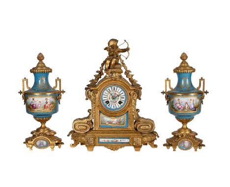 A FRENCH PORCELAIN INSET GILT METAL MANTEL CLOCKTHE MOVEMENT STAMPED FOR H.P. AND COMPANY, PARIS, LATE 19th CENTURYThe circul