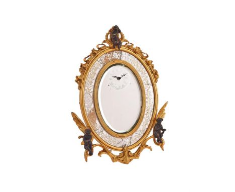 AN UNUSIAL FRENCH GILT BRASS FRAMED EASEL MIRROR STRUT TIMEPIECEUNSIGNED, LATE 19th CENTURYThe Swiss gilt watch type movement
