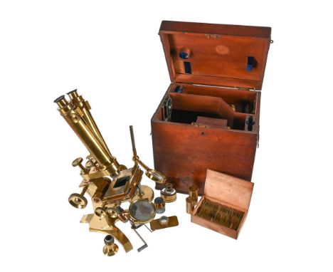 A VICTORIAN LACQUERED BRASS BINOCULAR CHEST MICROSCOPEBAKER, LONDON, THIRD QUARTER OF THE 19th CENTURYThe bifurcated tube wit