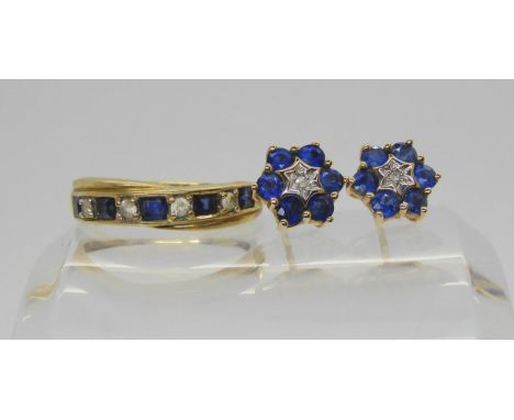 A 9ct gold blue and clear sapphire ring, size P1/2, together with a pair of 9ct sapphire and diamond accent flower earrings, 