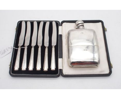 An Edwardian silver hip flask, by&nbsp;G &amp; J W Hawksley, Sheffield 1902, and a set of silver handled fruit knives, by Emi