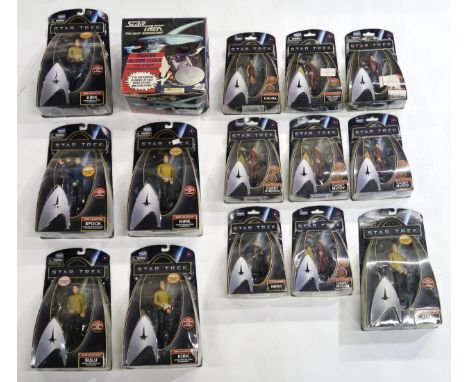 A quantity of packaged Star Trek action figures, together with a Star Trek: The Next Generation talking alarm clock Condition