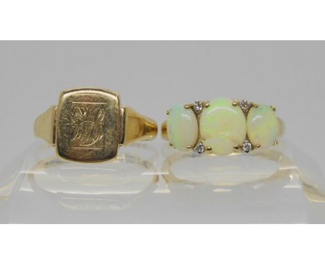 A 9ct gold opal and diamond ring, size O1/2, together with a 9ct gold signet ring size P, weight together 5.2gms Condition Re