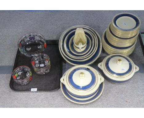 An Adderley Ware pottery dinner service, the cream ground with blue and gilt border, together with a painted glass dessert se