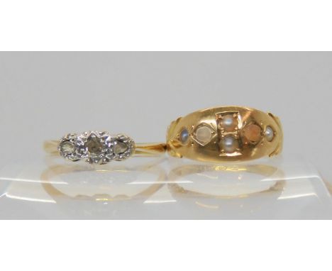 A 15ct gold ring set with pearls and coral, hallmarked Chester 1884, size L, weight 2.4gms, together with an 18ct gold three 