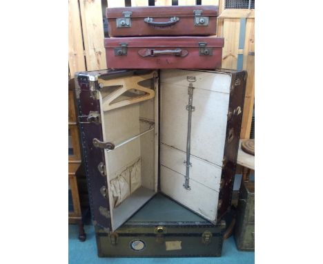 An early 20th century "Victor wardrobe luggage", steamer trunk and two suitcases (4) Condition Report:Available upon request
