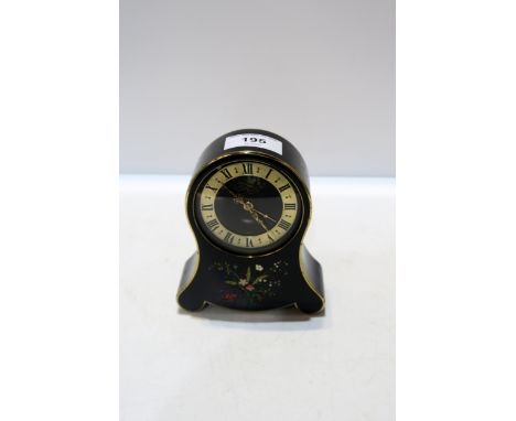 A Jaeger Petite Neuchateloise musical alarm clock, the black case with flower decoration, 12.5cm high Condition Report:Availa