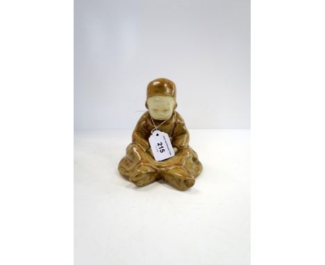 A&nbsp;Berthe Savigny Quimper figure of a seated child, signed painted mark, 14cm high Condition Report:Available upon reques