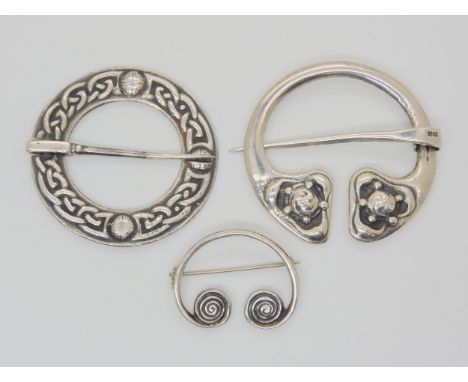 Two Alexander Ritchie silver brooches both stamped A.R, Iona ICA, Birmingham hallmarks on both for 1934 - 1935, together with