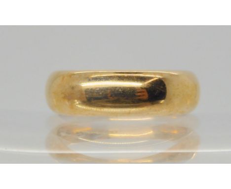 A yellow metal ring, size S, weight 9.7gms Condition Report:Available upon request