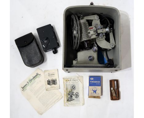 A cased Bell &amp; Howell Model 613H film projector and a Kodak Model BB Junior Cine camera, both with original instruction b